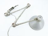 a lamp that is sitting on a table with a cord