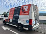 a van that is parked on the side of the road