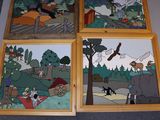 four stained glass pictures of people and animals in a wooded area