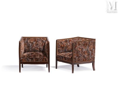 pair of leather armchairs in the manner of paul van deren