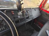a steering wheel and dashboard of a truck with a steering wheel