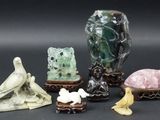 five different kinds of figurines sitting on a table
