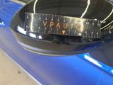 a close up of a car mirror with a measuring tape on it