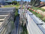 a train that is going down the tracks in the grass