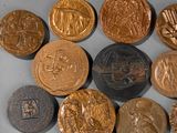 a lot of coins that are sitting on a table