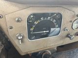 a close up of a speedometer on the dashboard of a motorcycle