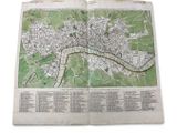 an old map of a city with a river in the middle of it