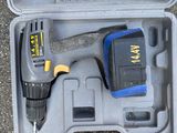 a tool in a case that is sitting on the ground
