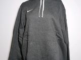 a grey hoodie with a white nike logo on it