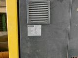 a machine that is sitting inside of a building