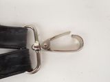 a black leather belt with a silver buckle on it