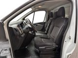 the interior of a car with the door open showing the driver ' s seat area