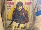 jacket with a picture of a man with a gun on it