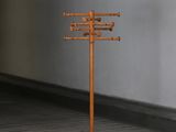 an image of a wooden display stand in an empty room