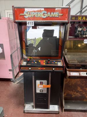 two arcade machines that are on display in a store