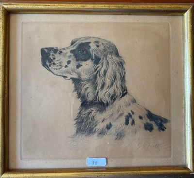 tableau représentant un chien noir et blanc dans un cadre doré