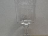 a glass that is sitting on a table
