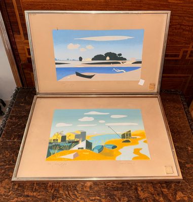 deux tableaux encadrés représentant une scène de plage avec un bateau dans l'eau