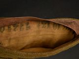 a close up of a pair of shoes with writing on them