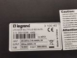 a label on the back of a laptop that says legrand