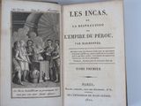 an old book with a picture of a group of people in it