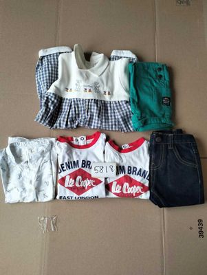 a cardboard box with clothes on it and a pair of jeans
