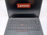 the lenovo laptop is open and ready to be used