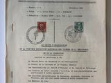 an old document with a stamp on it sitting on a table