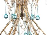 a chandelier that has a bunch of beads hanging from it