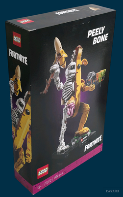 une boîte contenant une figurine Lego représentant un squelette tenant une banane