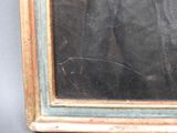 a picture of a painting on the wall of a room