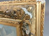 an image of a picture of a painting on a table