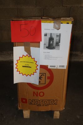 a cardboard box that has a sign on it