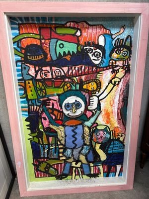 tableau représentant une femme et un chat, dans un cadre rose
