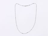 a white necklace with a silver chain on a white background