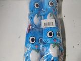 a bag of blue stuffed animals with eyes on them