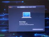 a computer screen with a laptop on top of it