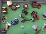 a box with many different types of jewelry in it