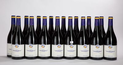 a group of bottles of wine sitting on top of a table