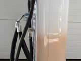 a machine that is sitting on a cart in the room