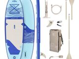 a close up of a paddle board with a paddle and accessories