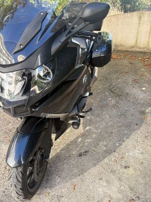 a motorcycle that is parked on the side of the road
