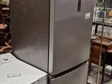 a refrigerator and a washing machine in a store
