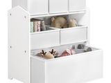 un gros plan sur un meuble de rangement pour jouets avec un ours en peluche
