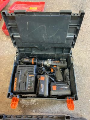 a tool box with tools in it sitting on the floor