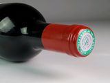a bottle of wine that is sitting on a table