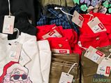 many different types of clothing for sale at the store