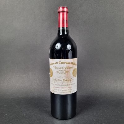 a bottle of wine that is sitting on a table