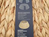 a close up of a woven basket bag with a label on it