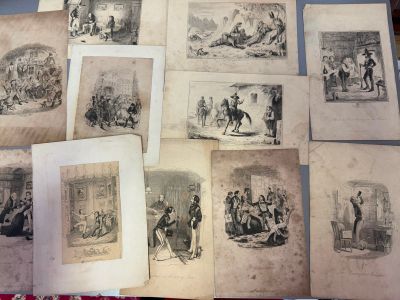 many old pictures of people on a table
